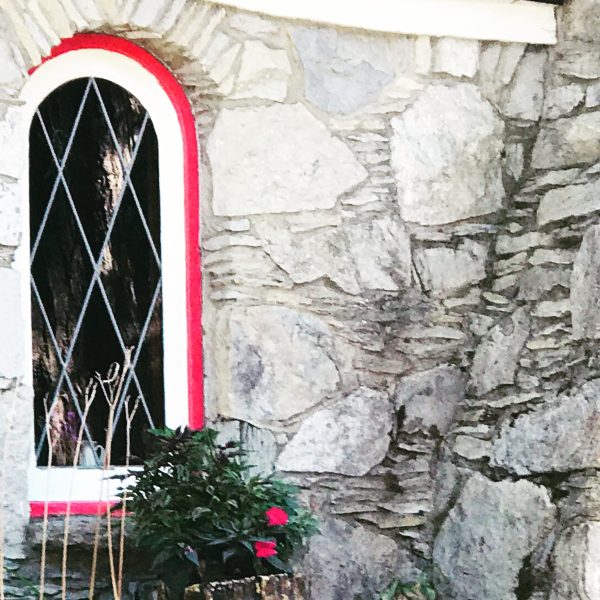 a person standing in front of a building